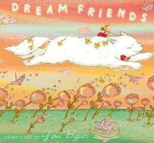 Cover of Dream Friends, by You Byun. The image is of an orange sky over green water with flowers made of bubbles growing out of it. A young girl rides the back of a large white mammal wearing a red bowtie who soars through the sky.