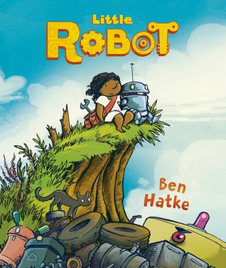 The cover of Little Robot, by Ben Hatke. A young person of colour and a small robot sit on a grassy ledge overlooking a junkyard. A black cat climbs on discarded tires, and an angry eye peers up from the trash.