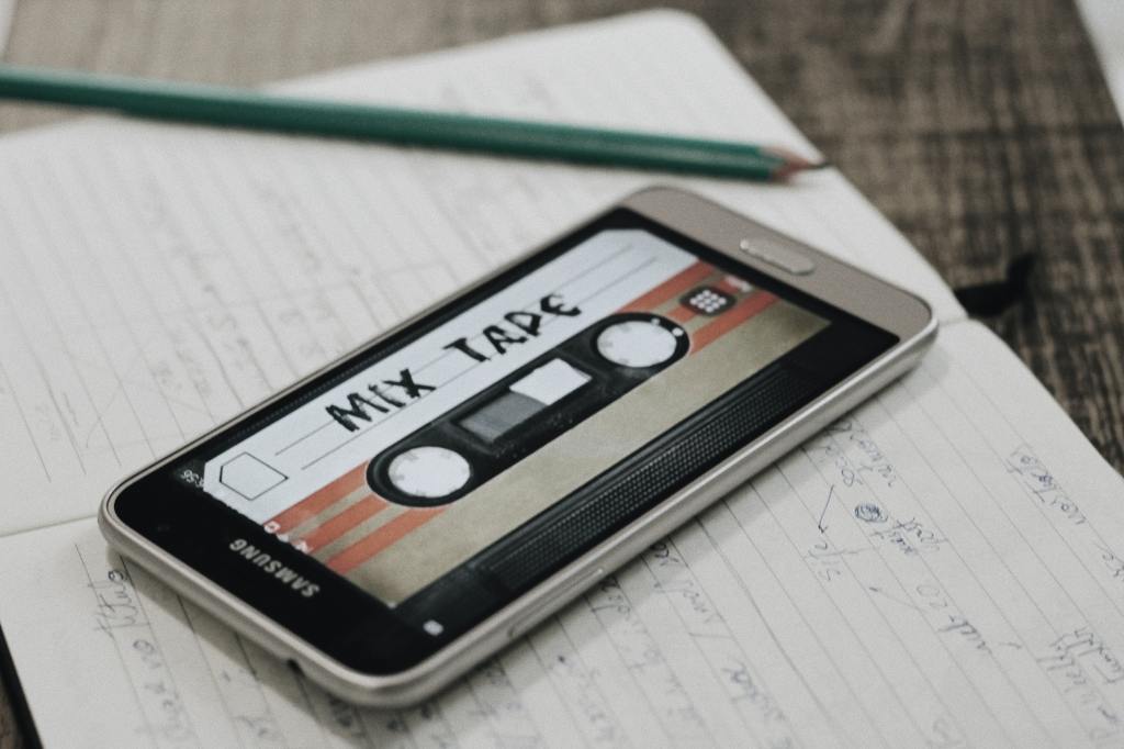 A cell phone displaying an image of an old school mix tape.